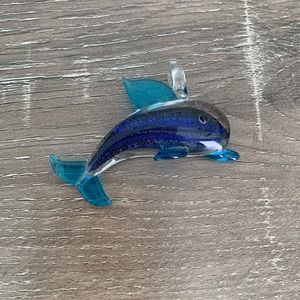 Transparent dolphin pendant